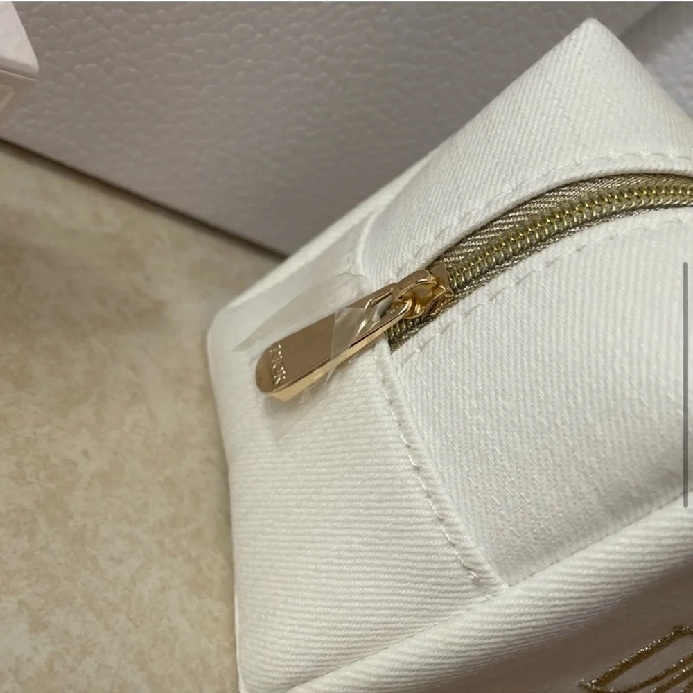 Dior White and Gold Cosmetic Pouch with Miss Dior Perfume